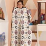 blanket mockup featuring a playful girl in her room 24691 3