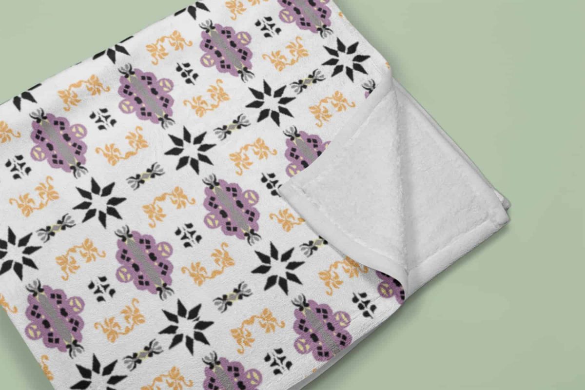 mockup of a folded throw blanket in a colored surface 24670 3