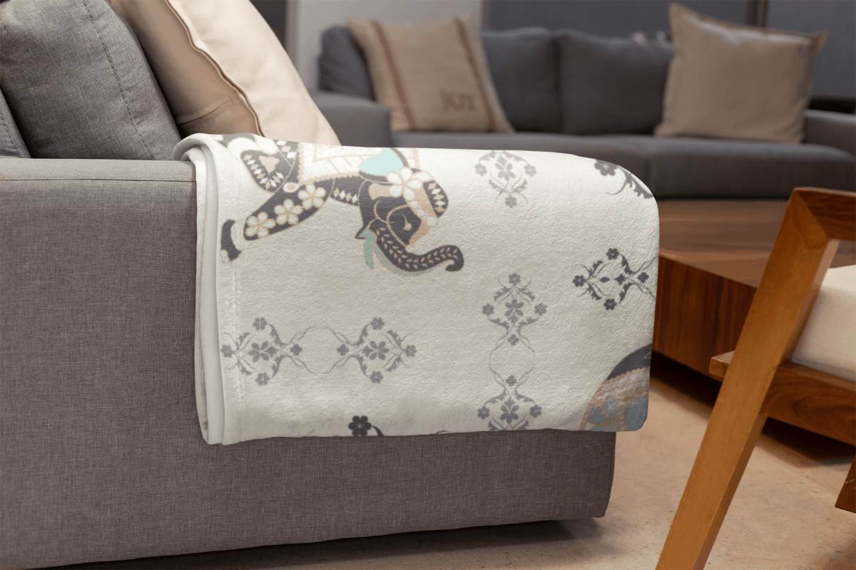 mockup of a throw blanket in a living room setting 24697 1