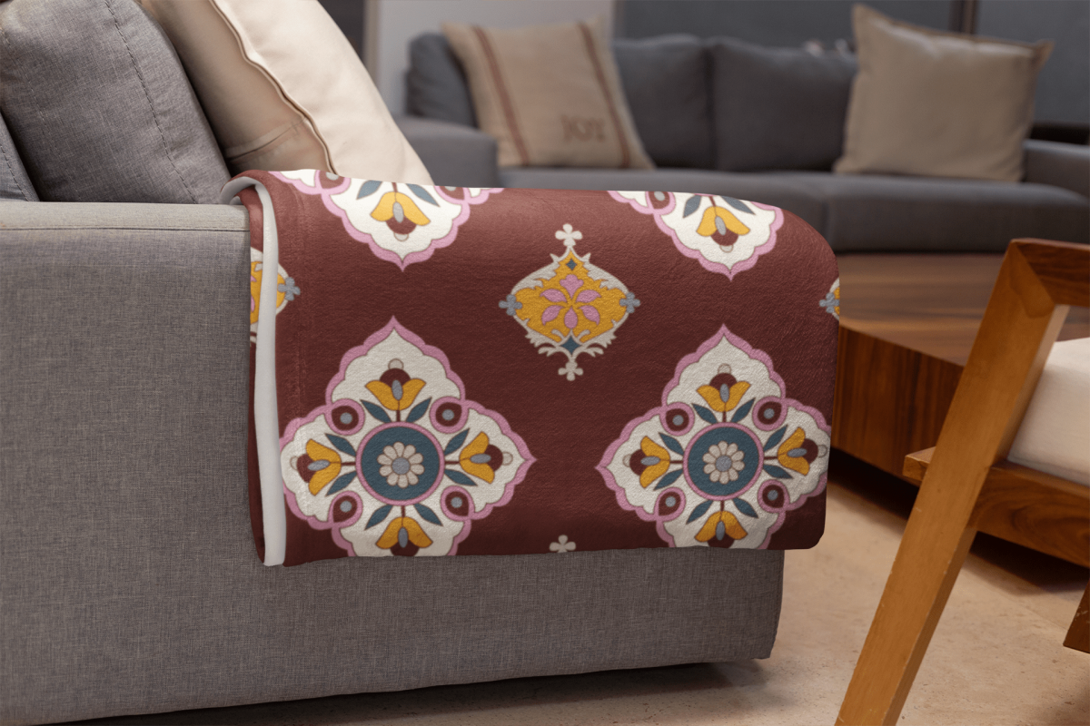 mockup of a throw blanket in a living room setting 24697 13