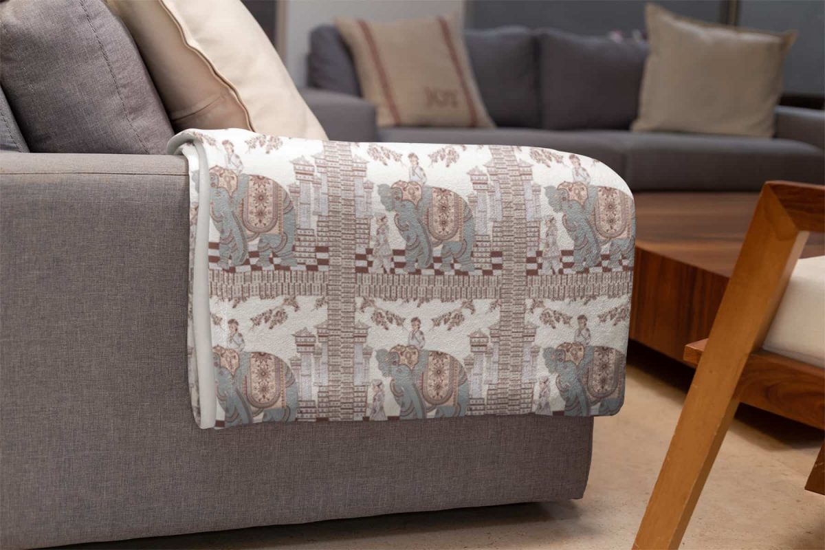 mockup of a throw blanket in a living room setting 24697 14