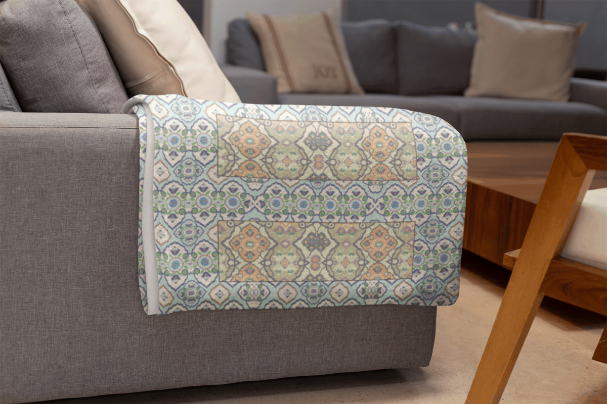 mockup of a throw blanket in a living room setting 24697 14