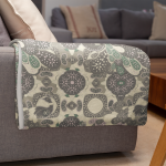 mockup of a throw blanket in a living room setting 24697 17