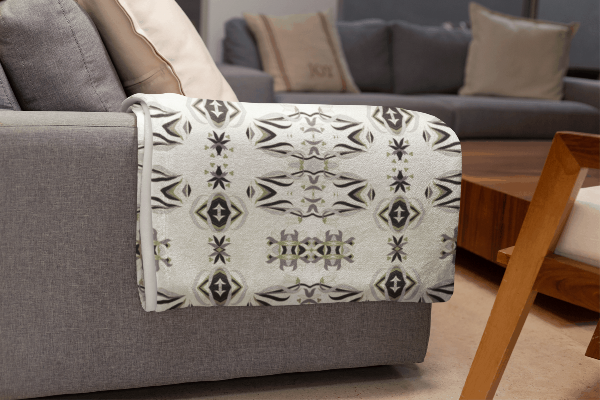mockup of a throw blanket in a living room setting 24697 24