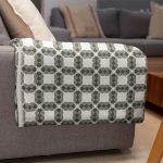 mockup of a throw blanket in a living room setting 24697 28
