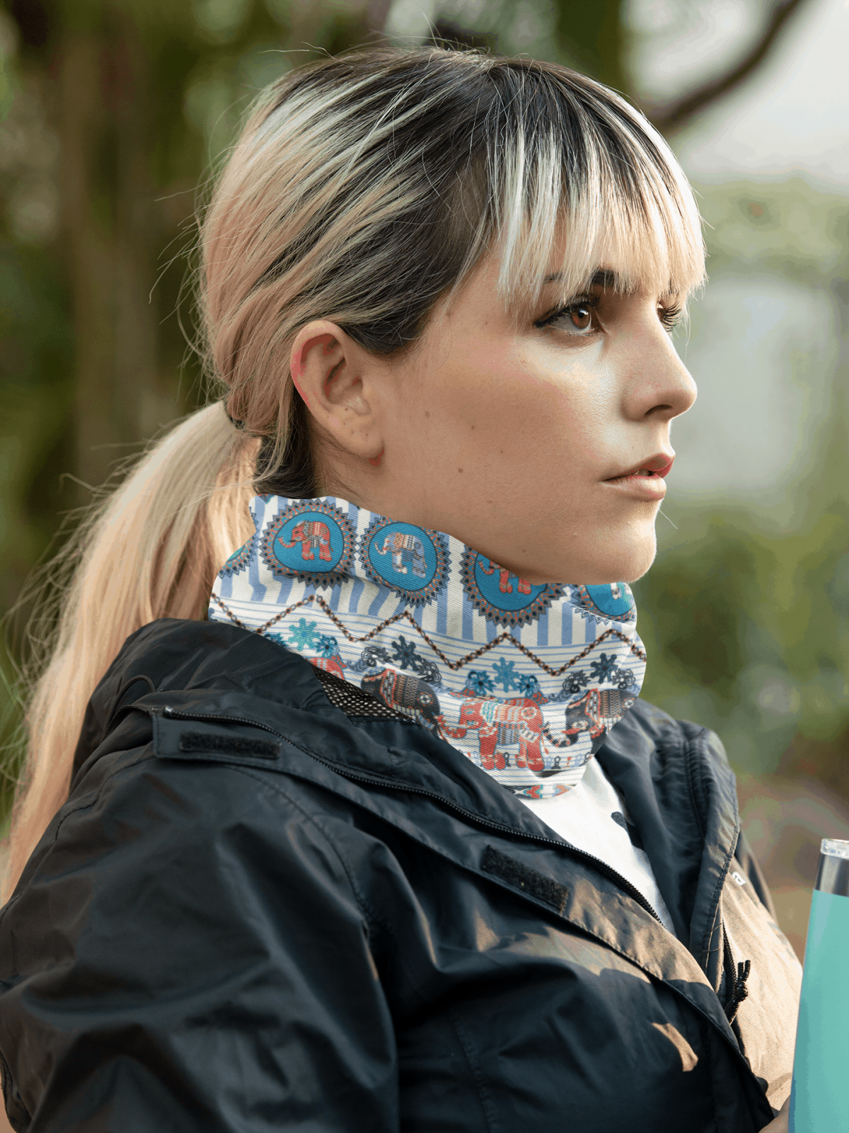 mockup of a young woman wearing a neck gaiter on the street 36141 2