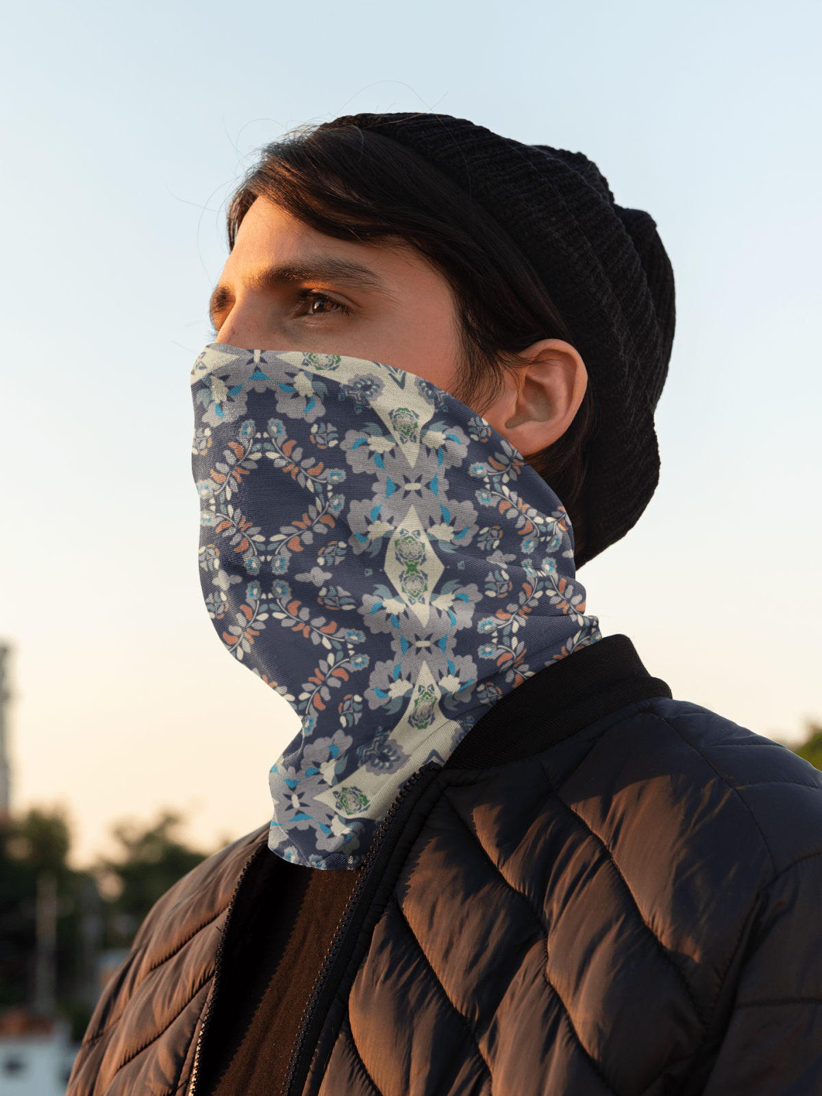 neck gaiter mockup of a man watching the sunrise 36086 5
